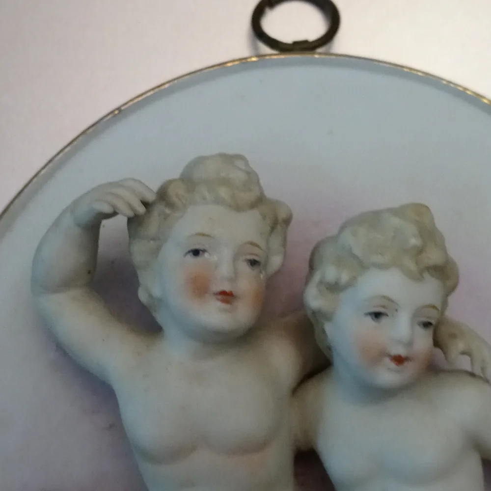 Antique cherub wall plaque